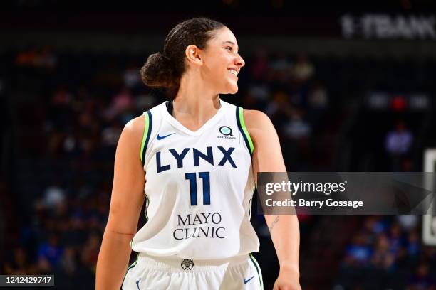 Natalie Achonwa of the Minnesota Lynx smiles during the game against the Phoenix Mercury on August 10, 2022 at Footprint Center in Phoenix, Arizona....