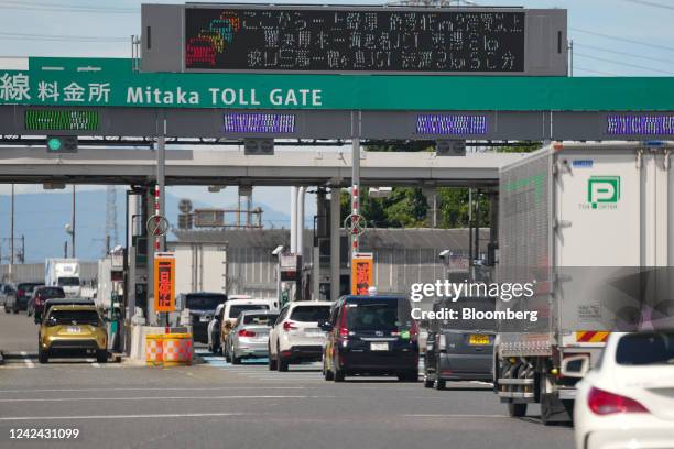 Vehicles pass the Mitaka toll gate on the Chuo Expressway in Mitaka, Tokyo Metropolis, Japan, on Thursday, Aug. 11, 2022. The Obon holiday,...