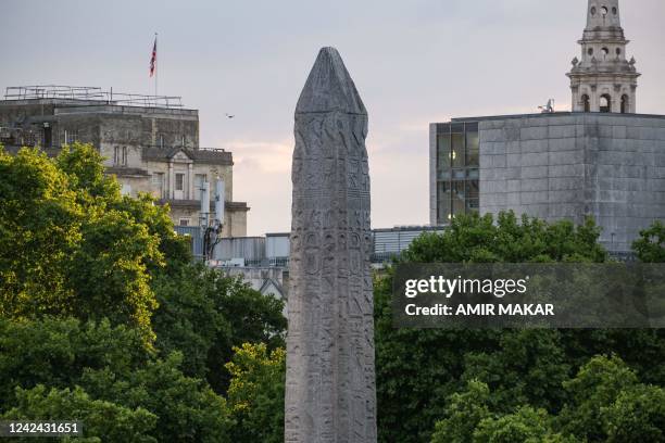 This picture taken on July 26, 2022 shows a view of the ancient Egyptian Obelisk of Thutmose III , known as Cleopatra's Needle", along the Thames...