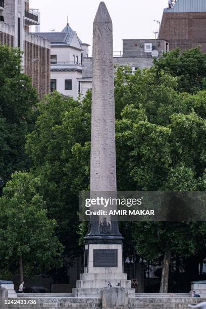 This picture taken on July 26, 2022 shows a view of the ancient Egyptian Obelisk of Thutmose III , known as Cleopatra's Needle", along the Thames...