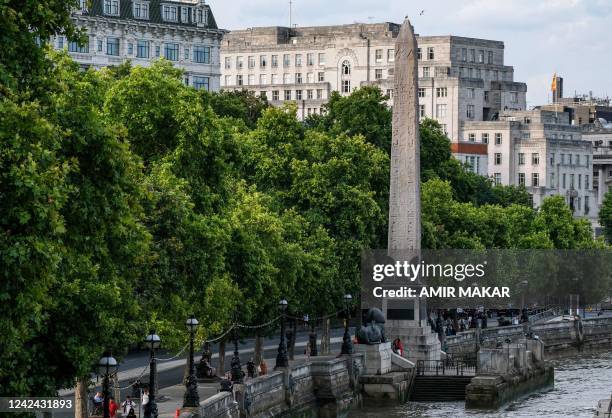 This picture taken on August 1, 2022 shows a view of the ancient Egyptian Obelisk of Thutmose III , known as Cleopatra's Needle", along the Thames...