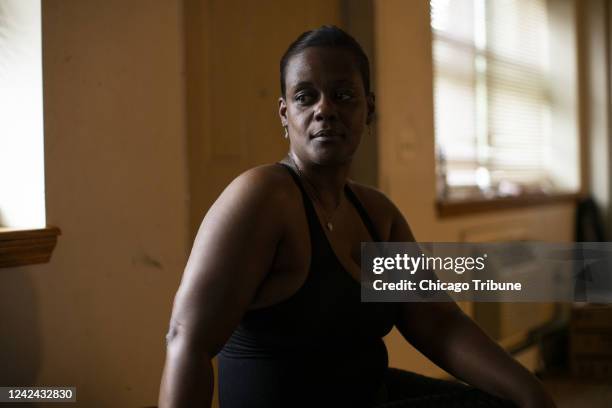 Santresa Harris, who lives in a Chicago Housing Authority row home in Washington Park, said a malfunctioning air conditioning unit made home...