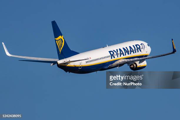 Ryanair Boeing 737-800 aircraft as seen departing from the Dutch airport Eindhoven EIN. The airplane is spotted during the taxiing, take off and...