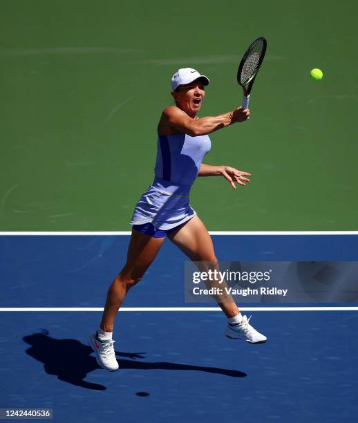 Simona Halep of Romania plays a shot against Jil Teichmann of Switzerland during the National Bank Open, part of the Hologic WTA Tour, at Sobeys...