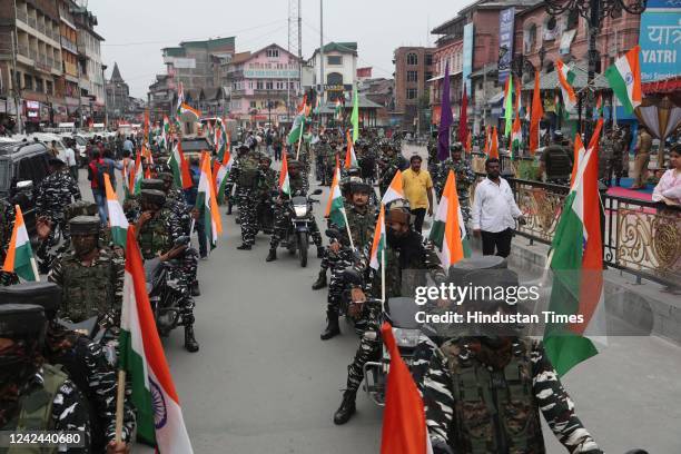 Central Reserve Police Force personnel take part in 'Har Ghar Tiranga' campaign as part of the 75th Independence celebrations, on August 11, 2022 in...