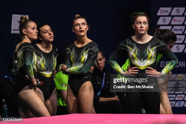 Bavaria , Germany - 11 August 2022; Ireland gymnasts, from left, Halle Hilton, Kate Molloy, Emily Moorehead and Emma Slavin look to the big screen as...