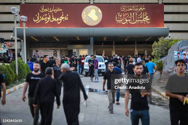Supporters of Shiite cleric Moqtada al-Sadr continue sit-in protest on the 13th day with the tents that they set up around the Parliament building in...