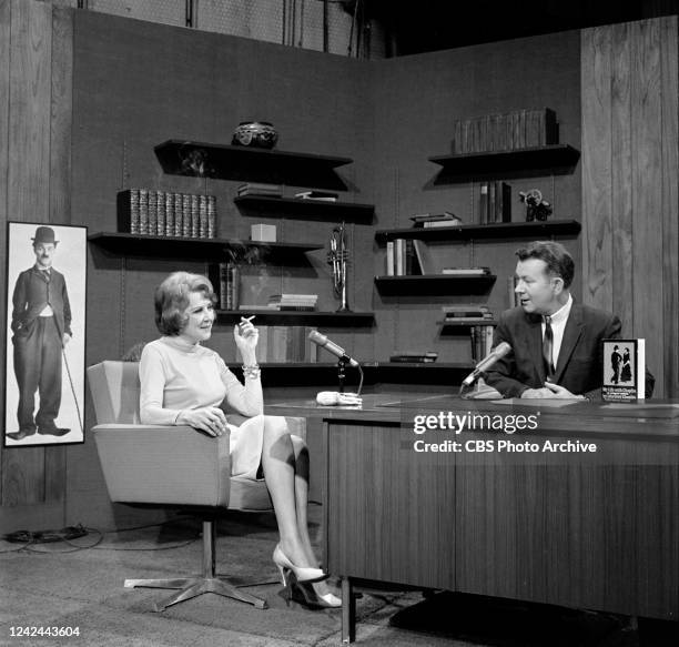 Bill Keene, , host of the "Keene at Noon" television program on KNXT. At left, visiting guest Lita Grey . October 17, 1966. Los Angeles, CA.