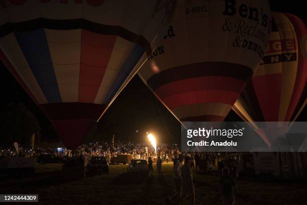 Hot air balloons are being prepared to glide sky at Bristol International Balloon Fiesta in Bristol, United Kingdom on August 11, 2022. The Bristol...