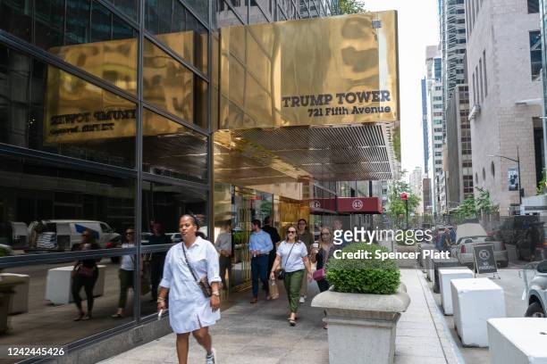 People walk by Trump Tower in Manhattan on August 10, 2022 in New York City. According to a recent report, the FBI was looking for nuclear-related...