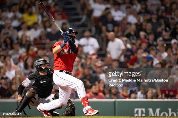 Eric Hosmer of the Boston Red Sox hits an rbi double during the sixth inning of a game against the Baltimore Orioles on August 11, 2022 at Fenway...