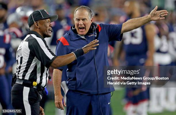 August 11: New England Patriots head coach Bill Belichick screams out at line judge Carl Johnson during the first half of the NFL game against the...