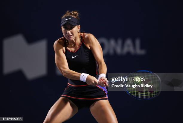 Belinda Bencic of Switzerland plays a shot against Garbine Muguruza of Spain during the National Bank Open, part of the Hologic WTA Tour, at Sobeys...