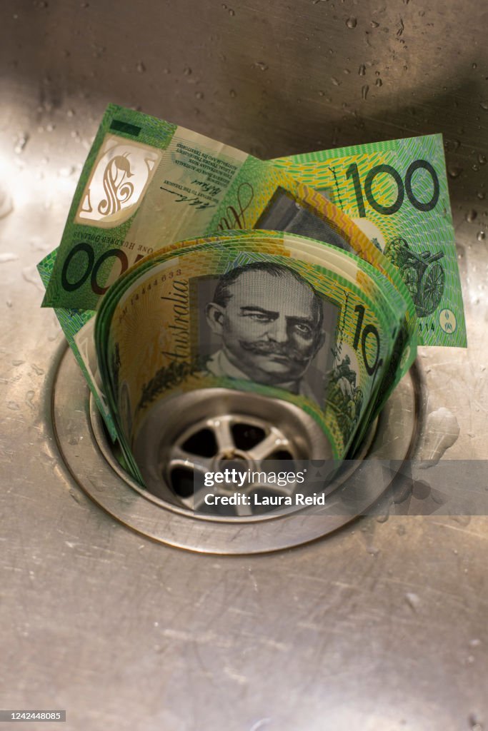 Throwing money down the sink