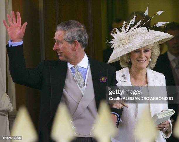Prince Charles and the Duchess of Cornwall, formerly Camilla Parker Bowles, leave the Guildhall in Windsor where they were married in a private...