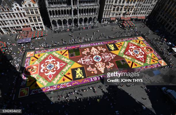 General view shows the Flower Carpet on the Grand-Place in Brussels on August 12, 2022. - The 22nd edition of Brussels' Flower Carpet begonia...