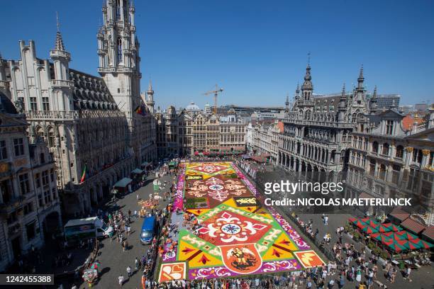 The last hand is put to the 50th edition of the Flower Carpet at The Grand Place/Grote Markt of Brussels, before it's opening today, Friday 12 August...