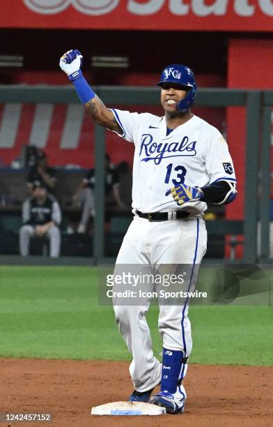 Kansas City Royals catcher Salvador Perez celebrates from second base after hitting a single and stealing second during a MLB game between the...