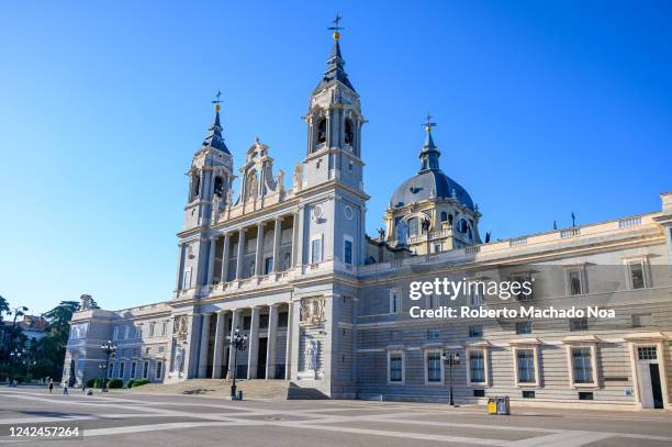 Almudena Cathedral . Side view of the whole facade of the famous building. The famous building was consecrated by Pope John Paul II in 1993.