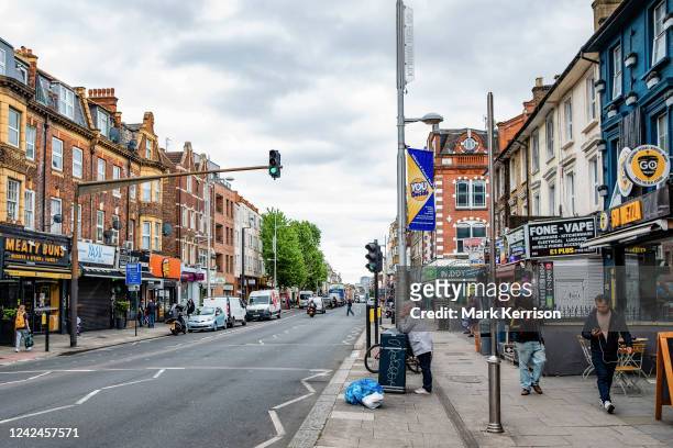 Kilburn High Road is pictured on 26th May 2022 in London, United Kingdom.