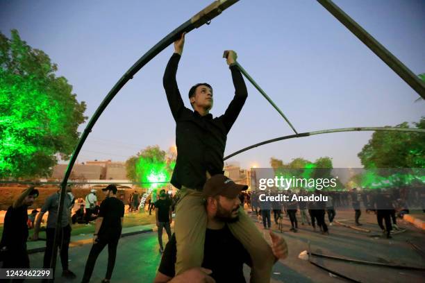 Supporters of Shiite cleric Moqtada al-Sadr continue sit-in protest on the 14th day with the tents that they set up around the Parliament building in...