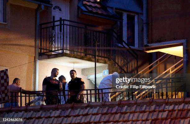 Crime scene investigators inspects a crime scene after a shooting on August 12, 2022 in Cetinje, Montenegro. Twelve people including the gunman have...