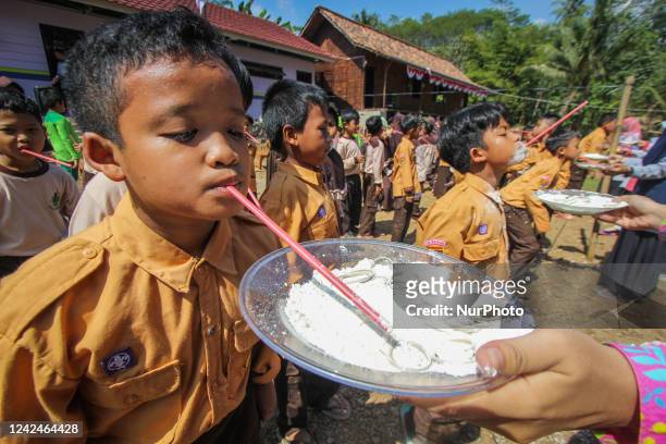 Students of Shagaqu, an Islamic school take part in the game competition during the Indonesian 77th Independence Day Anniversary celebration in...