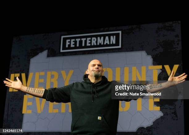 Democratic Senate candidate Lt. Gov. John Fetterman is welcomed on stage during a rally at the Bayfront Convention Center on August 12, 2022 in Erie,...