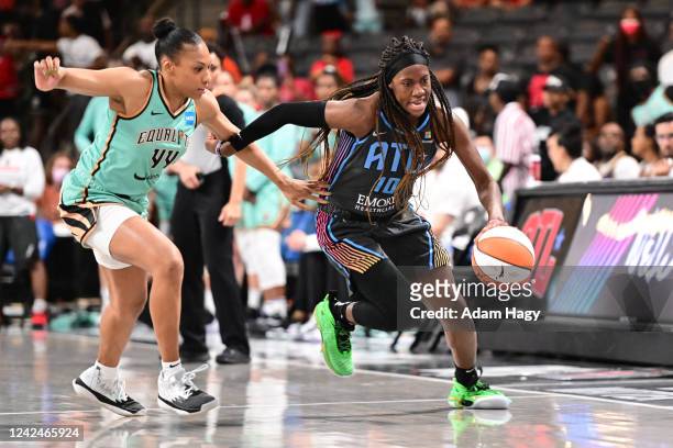 Rhyne Howard of the Atlanta Dream handles the ball during the game against the New York Liberty on August 12, 2022 at Gateway Center Arena in College...