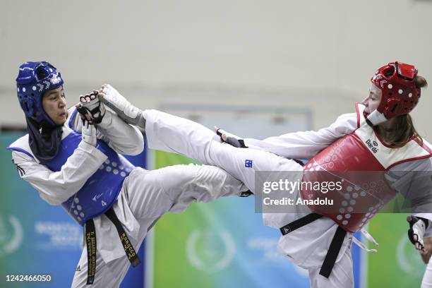 Osipova Svetlana of Uzbekistan in action against Aboufaras Fatima of Morocco during the women's 73 kg Taekwondo semi-final as part of the 5th Islamic...