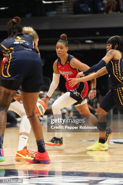 Natasha Cloud of the Washington Mystics drives to the basket during the game against the Indiana Fever on August 12, 2022 at the Gainbridge...