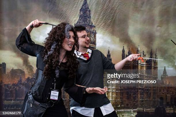 Harry Potter cosplay fans gather for a battle during Fan Expo Boston in Boston on August 12, 2022. - Fan Expo Boston is one of the first large-scale...