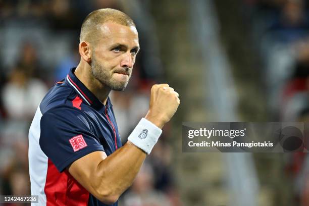 Daniel Evans of Great Britain reacts after winning a point against Tommy Paul of the United States during Day 7 of the National Bank Open at Stade...