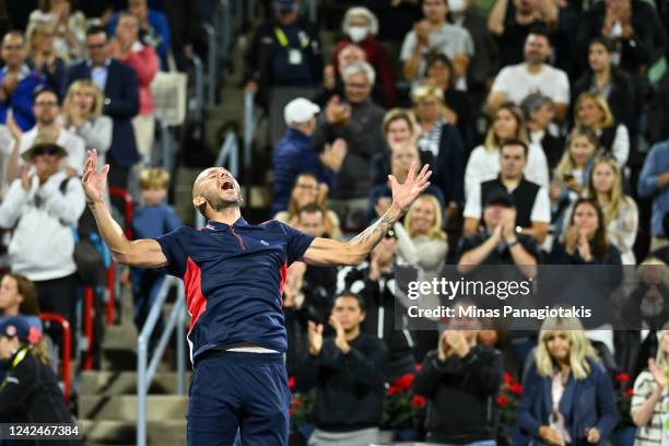 Daniel Evans of Great Britain celebrates his victory against Tommy Paul of the United States during Day 7 of the National Bank Open at Stade IGA on...