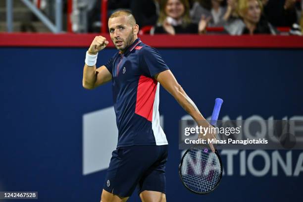 Daniel Evans of Great Britain reacts as he celebrates a point against Tommy Paul of the United States during Day 7 of the National Bank Open at Stade...