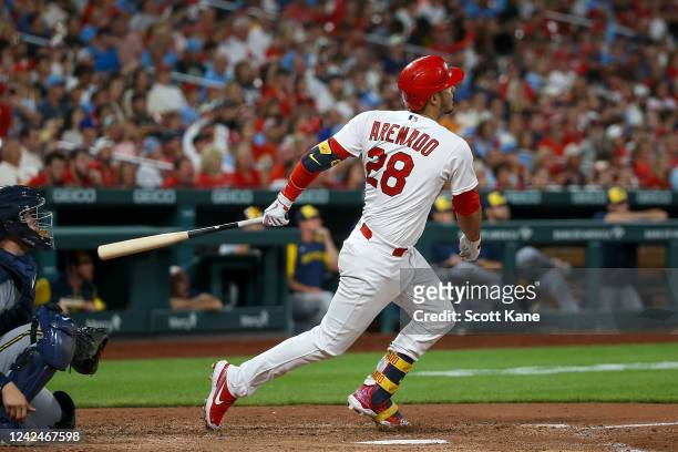 Nolan Arenado of the St. Louis Cardinals hits a solo home run during the sixth inning against the Milwaukee Brewers at Busch Stadium on August 12,...