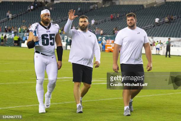 Lane Johnson, Jason Kelce, and Landon Dickerson of the Philadelphia Eagles walk off the field after the preseason game against the New York Jets at...