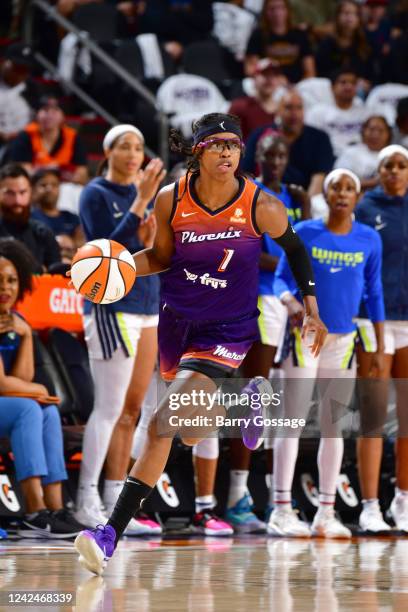 Diamond DeShields of the Phoenix Mercury dribbles the ball during the game against the Dallas Wings on August 12, 2022 at Footprint Center in...