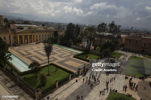 People are seen at Nunez Square in front of Narino Palace, the presidential office and residence in Bogota, Colombia, Friday, Aug. 12, 2022. The new...