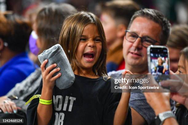 Young Atlanta fan is excited after catching a t-shirt during the WNBA game between the New York Liberty and the Atlanta Dream on August 12th, 2022 at...