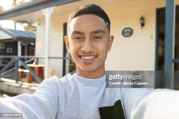 teenager takes selfie outside of house - cute teens stock pictures, royalty-free photos & images