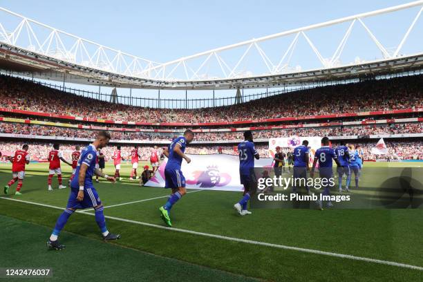 Leicester City take to the pitch ahead of the Premier League match between Arsenal FC and Leicester City at Emirates Stadium on August 13, 2022 in...