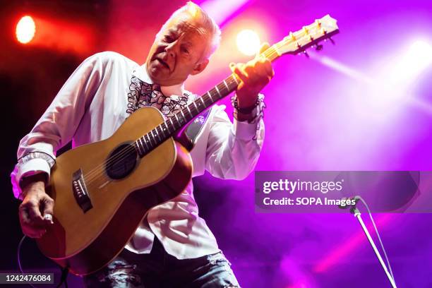 Australian guitarist Tommy Emmanuel performs live during a concert at Bambu Festival. He is known as one of the greatest acoustic guitarist of all...