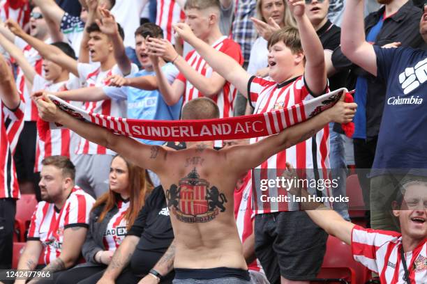 Sunderland fans sing during the Sky Bet Championship match between Sunderland and Queens Park Rangers at the Stadium of Light on August 13, 2022 in...