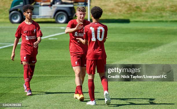 Lewis Koumas of Liverpool celebrates scoring Liverpool's sixth goal with Ranel Young at AXA Training Centre on August 13, 2022 in Kirkby, England.