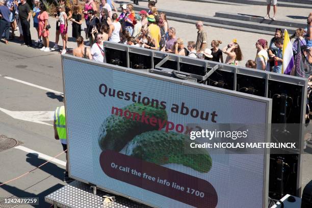 Illustration picture shows an information screen with an info campaign on monkey pox, during the 2022 edition of the 'Antwerp Pride' Parade, part of...