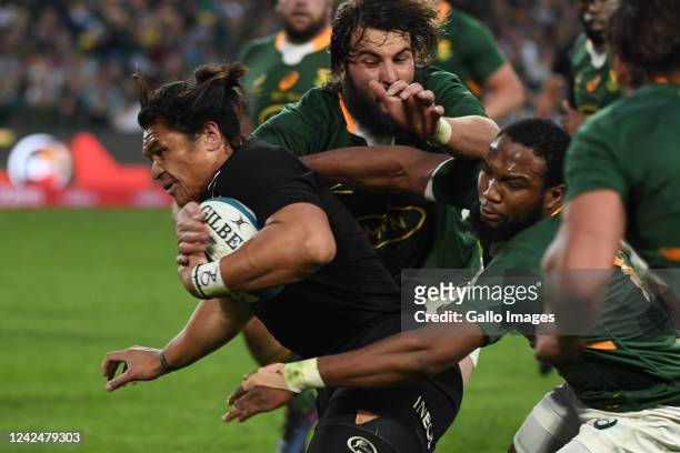 Caleb Clarke of NZ tacked by Lukhanyo Am of the Springbok during The Rugby Championship match between South Africa and New Zealand at Emirates...