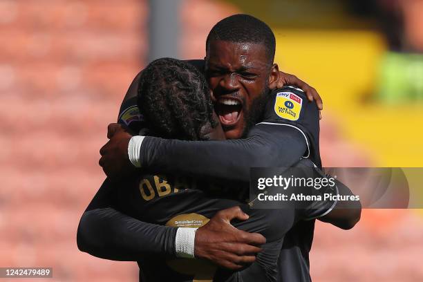 Olivier Ntcham celebrates his goal with Michael Obafemi of Swansea City during the Sky Bet Championship match between Blackpool and Swansea City at...