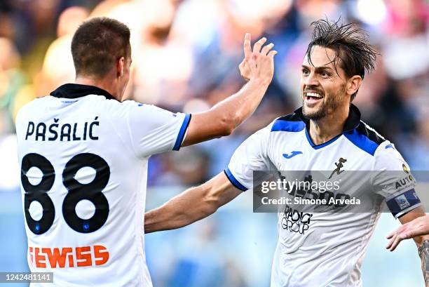 Rafael Tolói of Atalanta celebrates with his team-mate Mario Pasalic after scoring a goal during the Serie A match between UC Sampdoria and Atalanta...