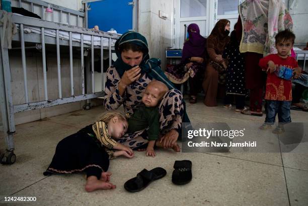 Children on a children’s ward at Indira Gandhi hospital receive treatment for malnutrition on August 13, 2022 in Kabul, Afghanistan. The collapse of...